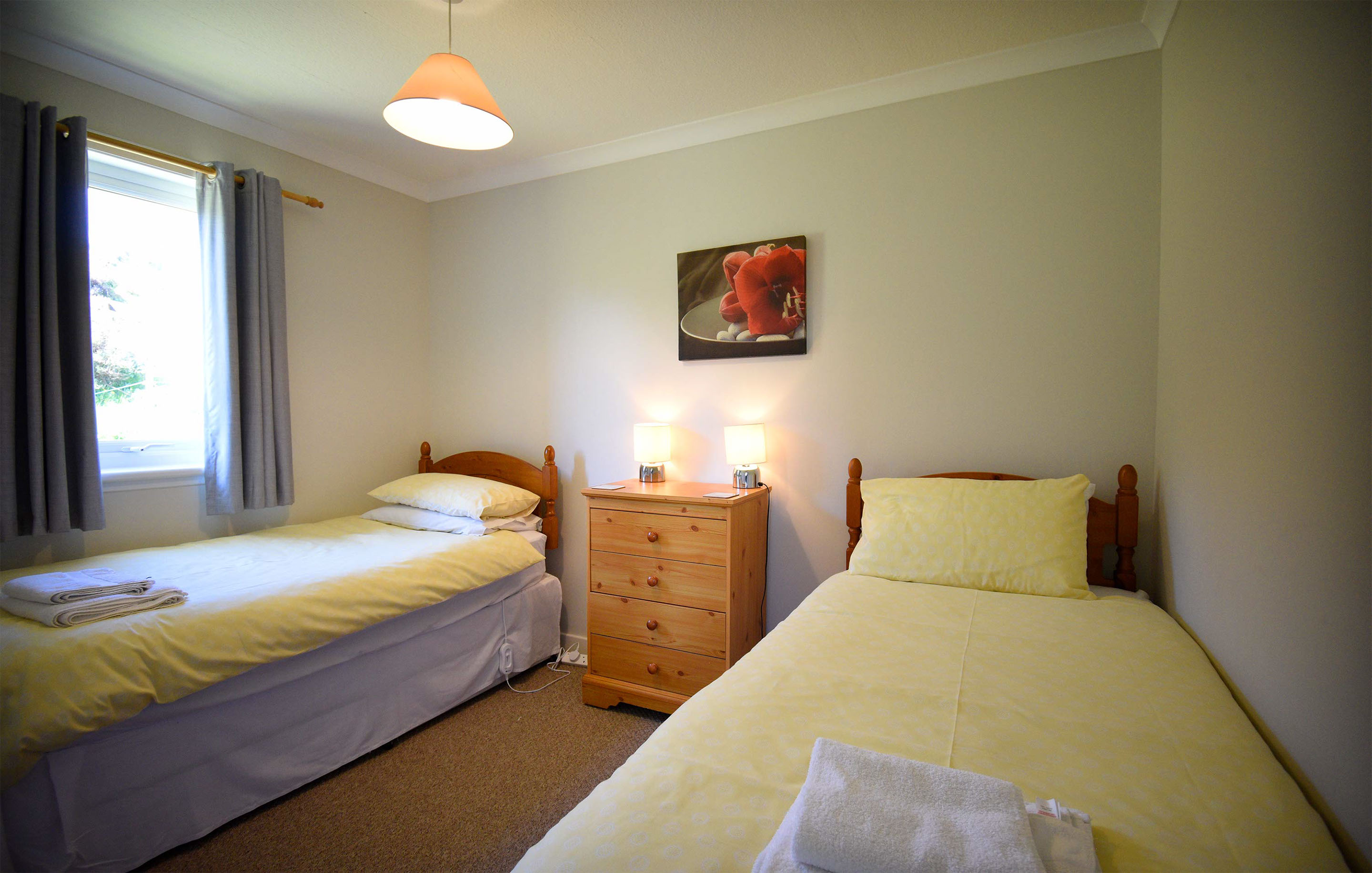 Half of Three self catering accommodation contains a modern kitchen with oven hob and fridge freezer