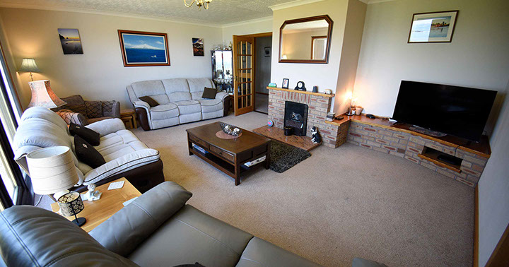 Gairloch View Bed and Breakfast contains a living room with TV and WIFI internet