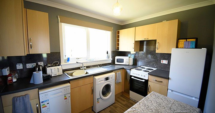 Kenmore Cottage self catering accommodation contains a modern kitchen with oven microwave kettle and fridge freezer