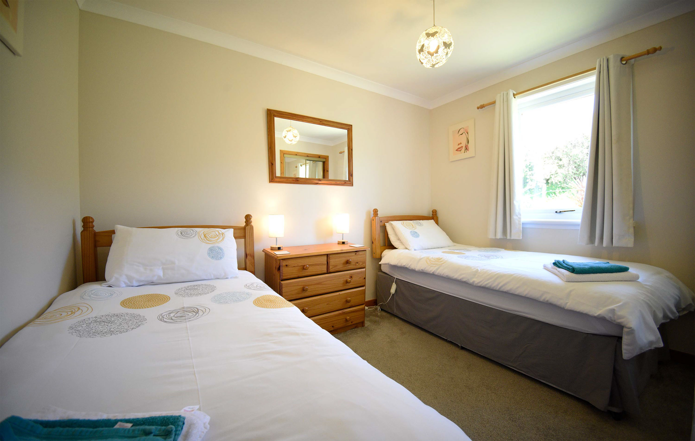 Half of Three self catering accommodation contains a modern kitchen with oven hob and fridge freezer